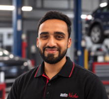 Murtaza, Service Advisor at AutoNiche, wearing an AutoNiche polo